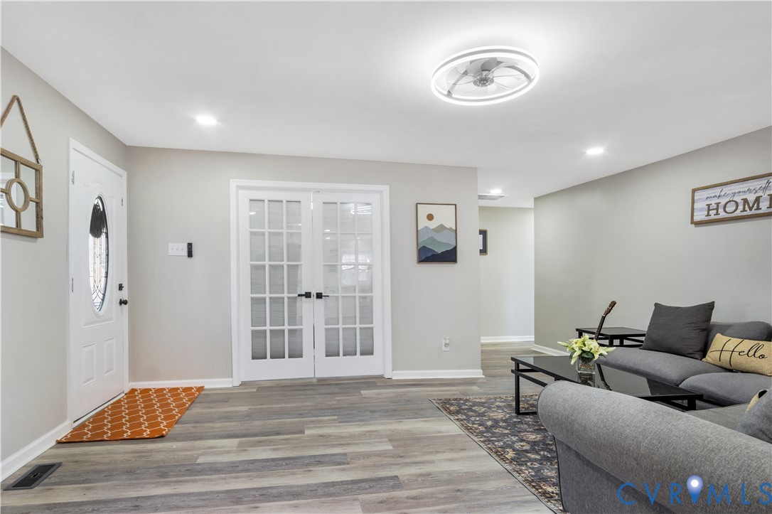 113 Red Dirt Road Williamsburg, VA 23188 - Photo 8 of 41 a living room with furniture and wooden floor