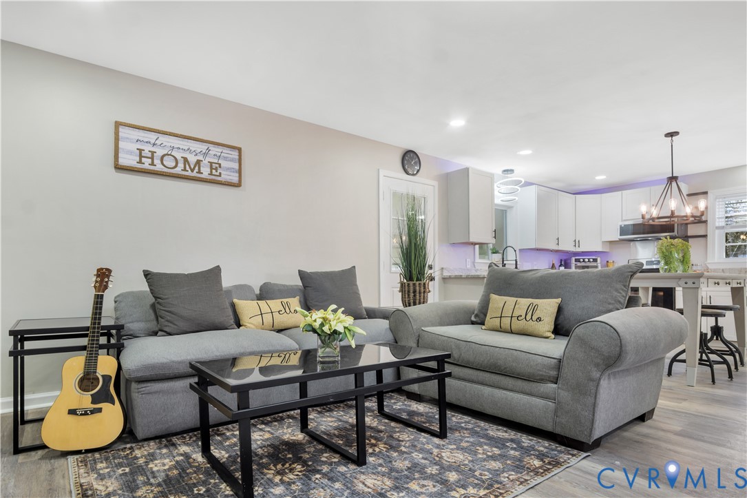113 Red Dirt Road Williamsburg, VA 23188 - Photo 9 of 41 a living room with furniture and kitchen view