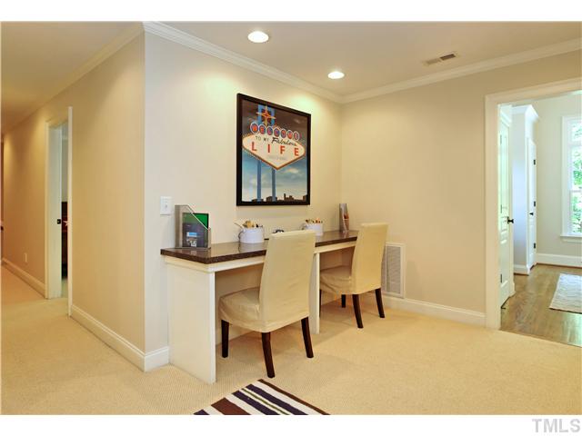 611 Runnymede Road Raleigh, NC 27607 - Photo 20 of 25 a view of a dining room with furniture