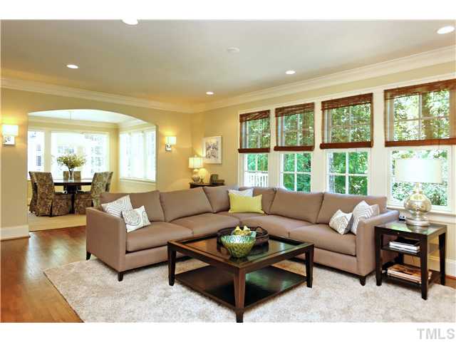 611 Runnymede Road Raleigh, NC 27607 - Photo 2 of 25 a living room with furniture and a large window
