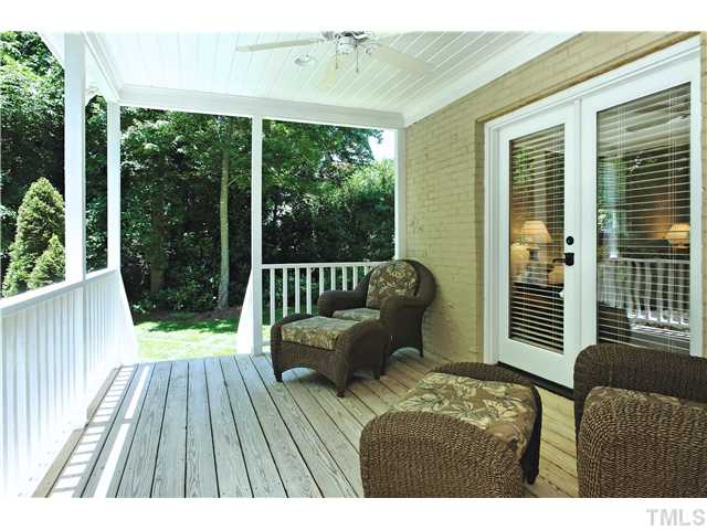 611 Runnymede Road Raleigh, NC 27607 - Photo 22 of 25 a balcony with wooden floor