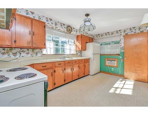 36 Sabin Street Springfield, MA 01151 - Photo 11 of 33 a kitchen that has a lot of cabinets in it