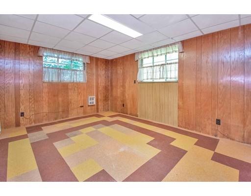 36 Sabin Street Springfield, MA 01151 - Photo 24 of 33 a view of an empty room with window and wooden floor