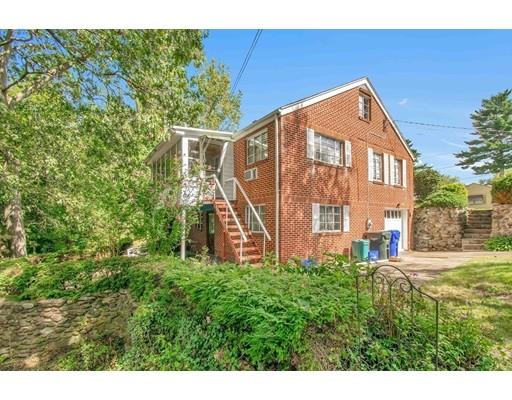 36 Sabin Street Springfield, MA 01151 - Photo 32 of 33 a front view of a house with a yard