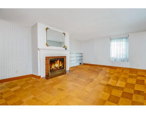 36 Sabin Street Springfield, MA 01151 - Photo 5 of 33 a bedroom with a bed and a fireplace
