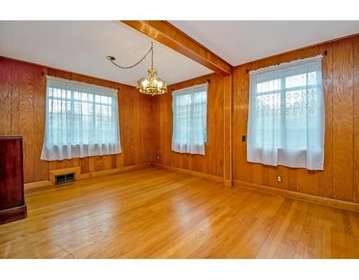 36 Sabin Street Springfield, MA 01151 - Photo 7 of 33 a view of an empty room with window and wooden floor