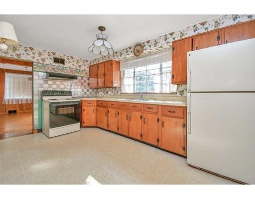36 Sabin Street Springfield, MA 01151 - Photo 9 of 33 a kitchen with stainless steel appliances granite countertop a refrigerator a stove and a sink