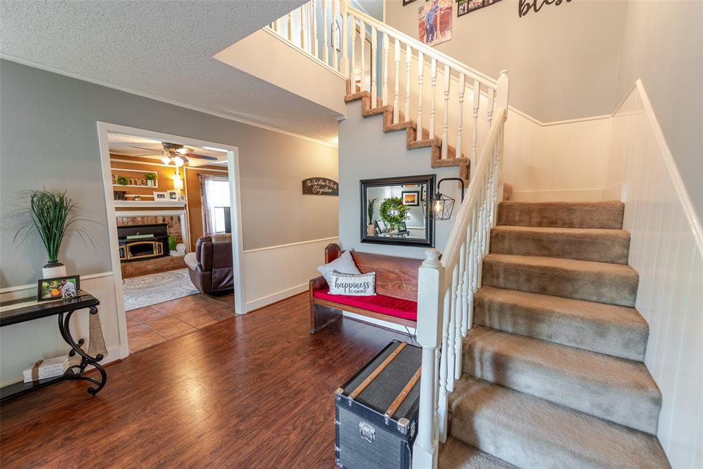 180 Se Creek Scroggins, TX 75480 - Photo 5 of 24 a view of entryway and hall with wooden floor