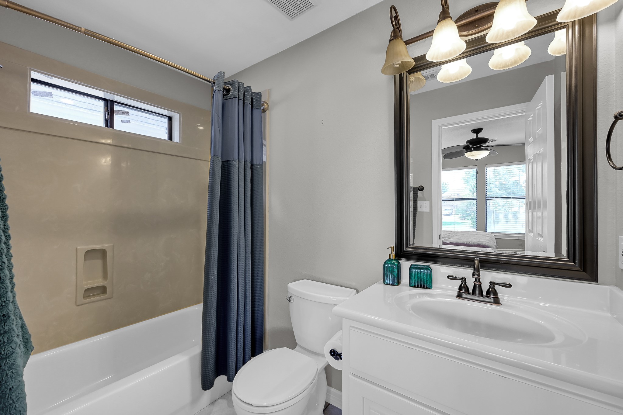 12394 Pebble View Drive Conroe, TX 77304 - Photo 26 of 49 a bathroom with a sink a toilet and shower