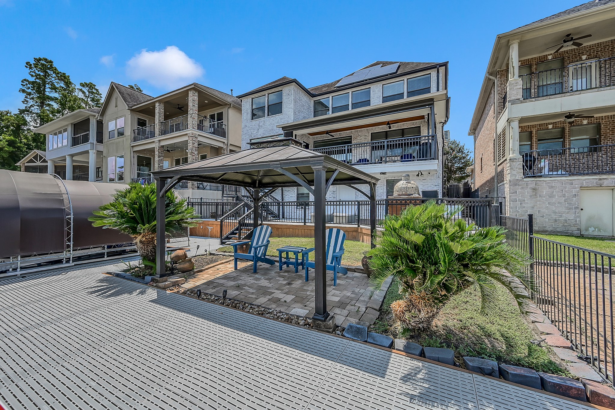 12394 Pebble View Drive Conroe, TX 77304 - Photo 38 of 49 Relax and enjoy stunning sunsets from your own covered gazebo—an ideal retreat.