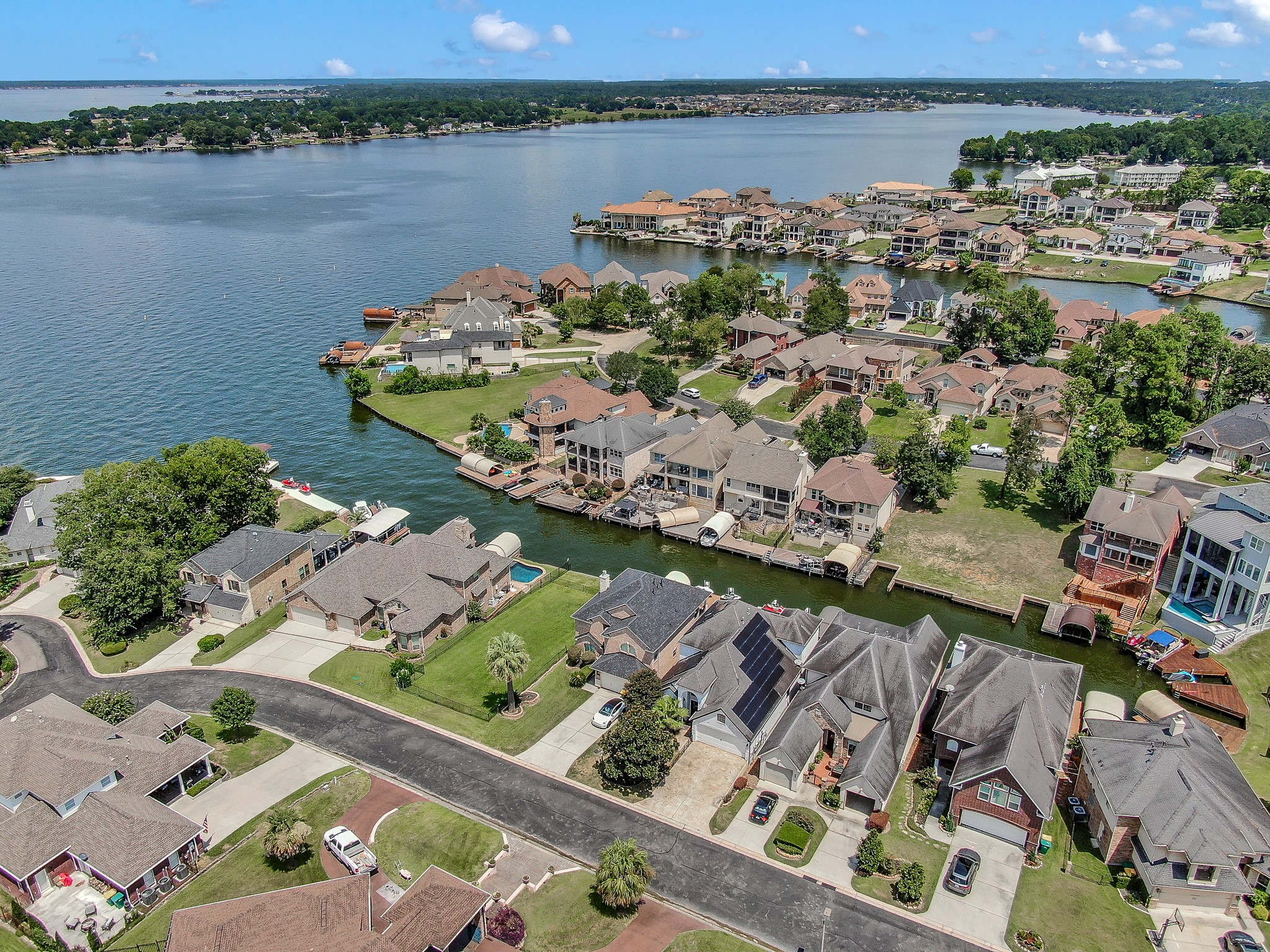 12394 Pebble View Drive Conroe, TX 77304 - Photo 39 of 49 an aerial view of a city with lake view