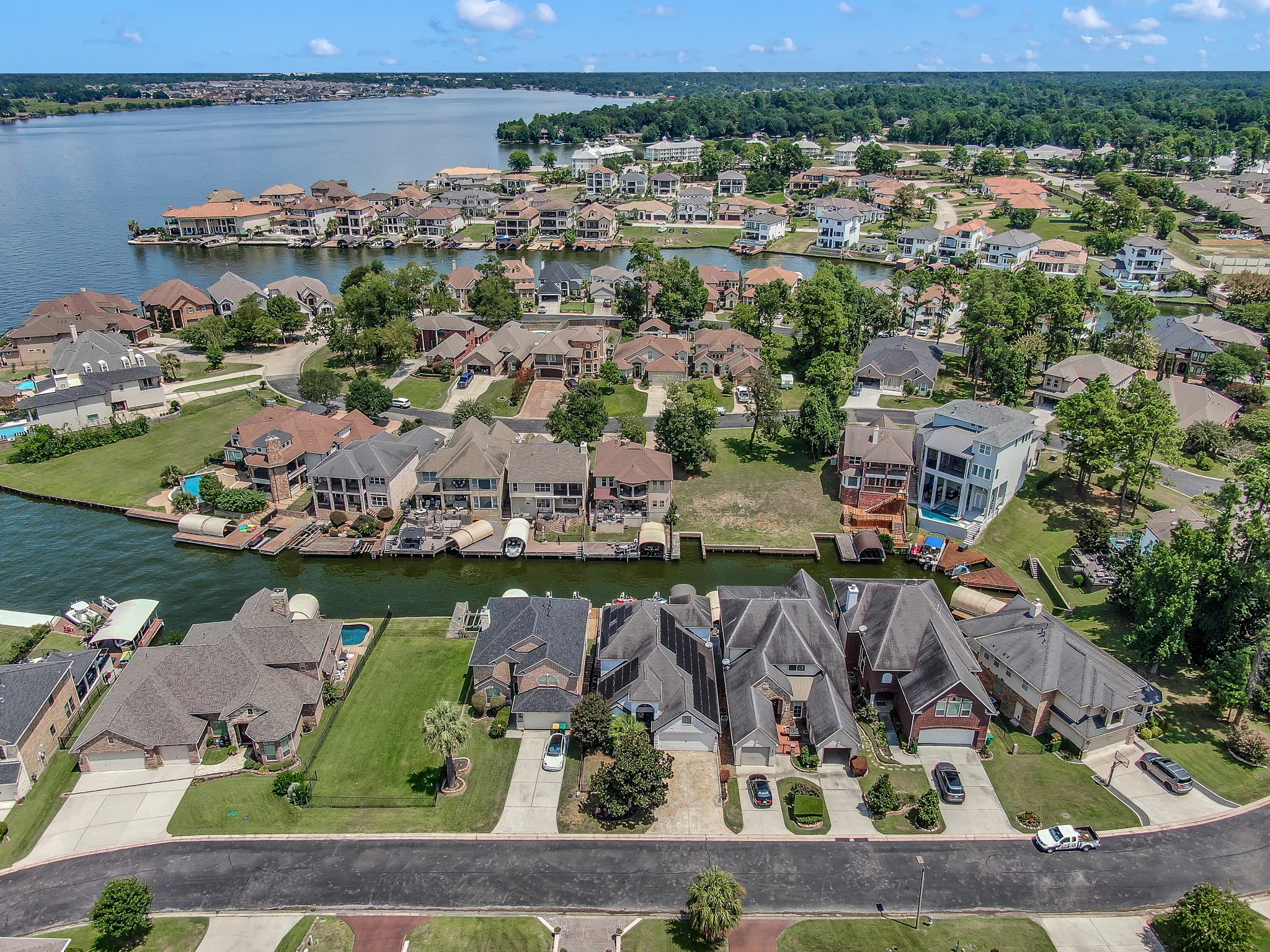 12394 Pebble View Drive Conroe, TX 77304 - Photo 44 of 49 an aerial view of a house with a lake view