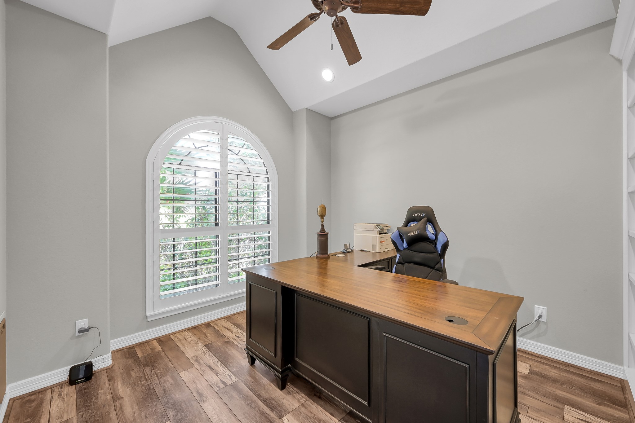 12394 Pebble View Drive Conroe, TX 77304 - Photo 6 of 49 Bright home office with ample shelving, perfect for productivity.