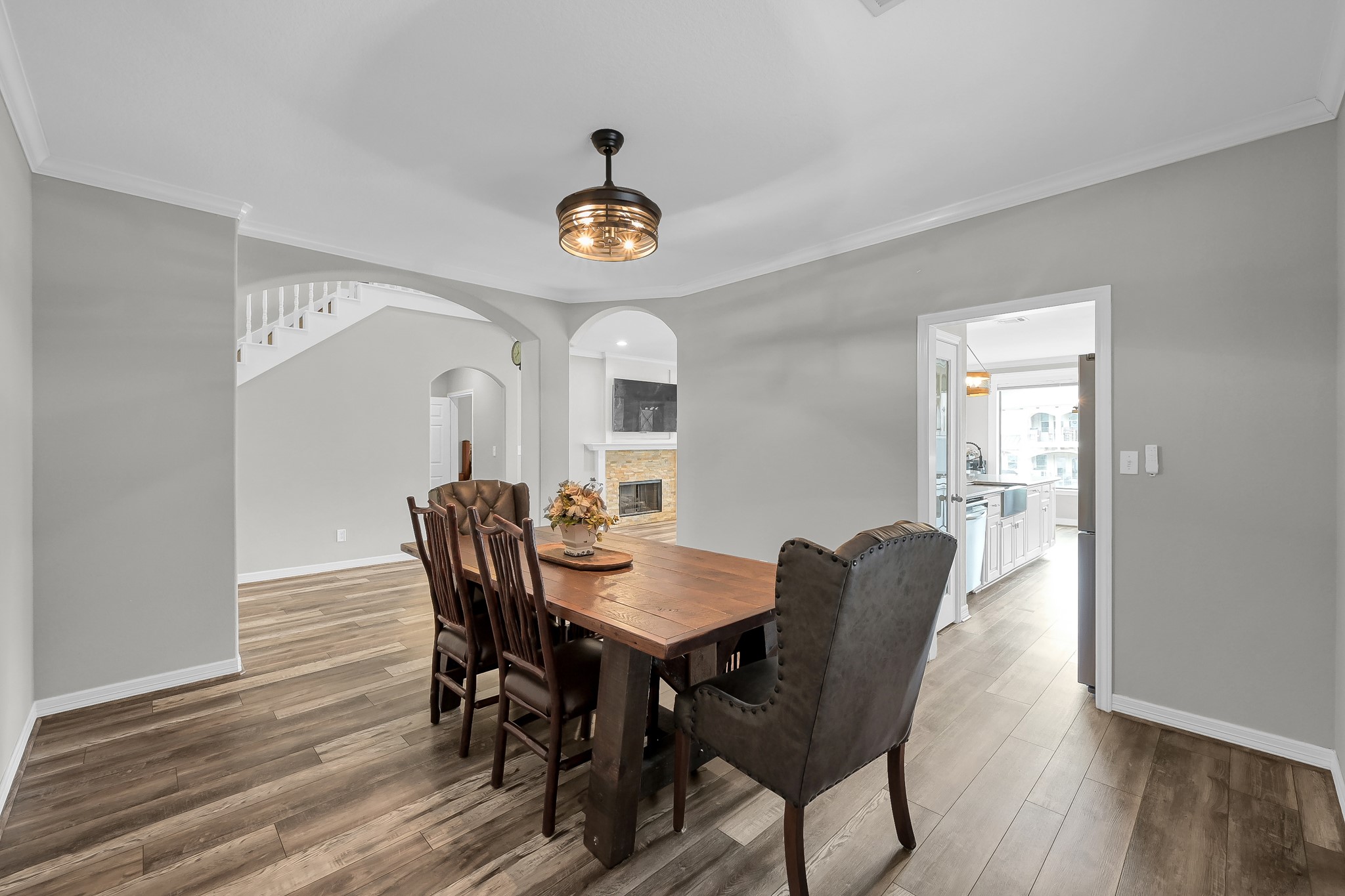 12394 Pebble View Drive Conroe, TX 77304 - Photo 9 of 49 a view of a dining room with furniture window and wooden floor