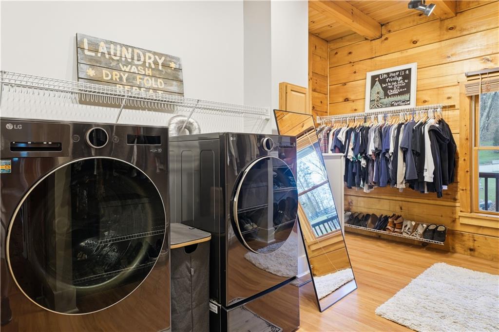 2865 Hightower Road Ball Ground, GA 30107 - Photo 22 of 41 a utility room with dryer and washer
