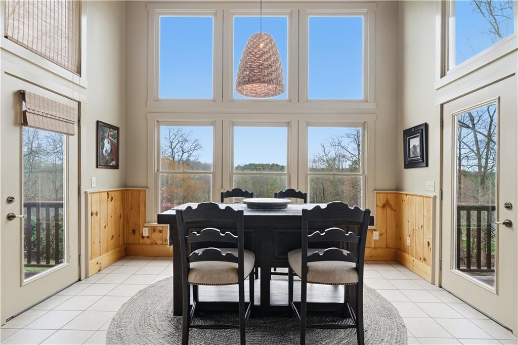 2865 Hightower Road Ball Ground, GA 30107 - Photo 9 of 41 a view of a dining room with furniture