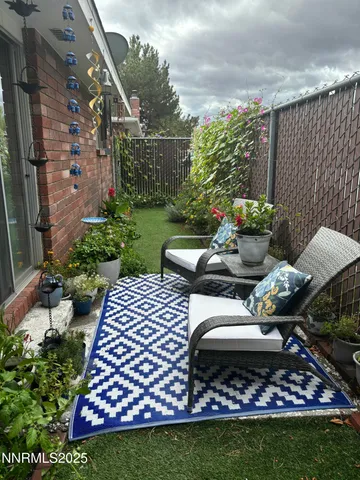 a view of a patio in backyard