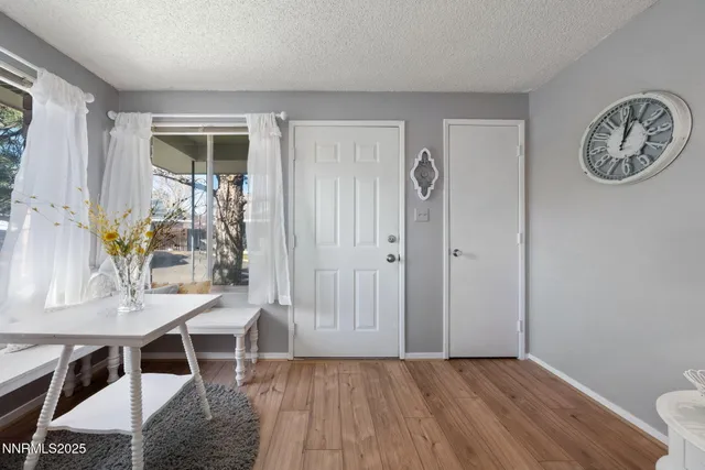 a view of a livingroom with furniture and window
