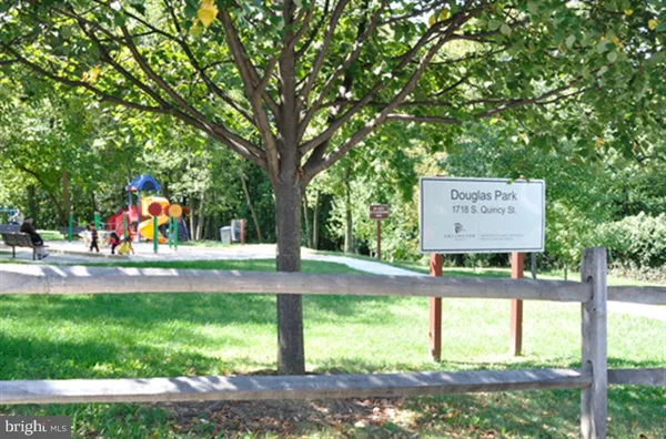 a view of a swimming pool and a yard