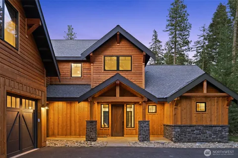 a front view of a house with yard