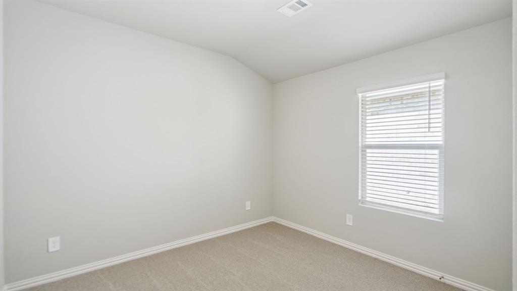 2218 Rannoch Street Sherman, TX 75092 - Photo 16 of 28 an empty room with a window