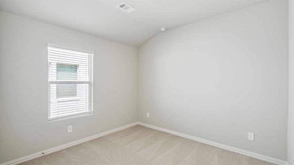 2218 Rannoch Street Sherman, TX 75092 - Photo 18 of 28 an empty room with a window