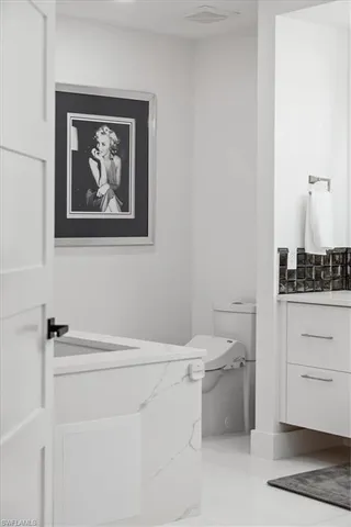 a bathroom with a sink and a stove