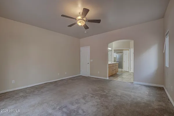 a spacious bathroom with a double vanity sink shower and a mirror