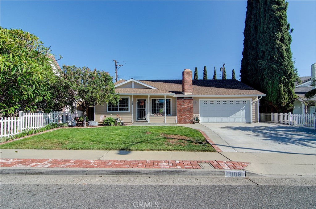 a view of house with outdoor space and street view