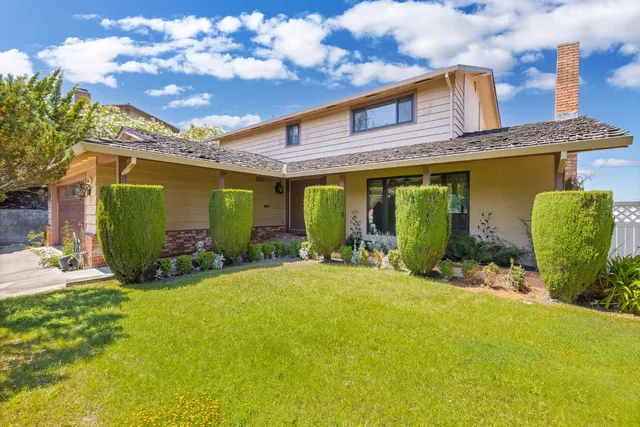 a view of a house with a patio