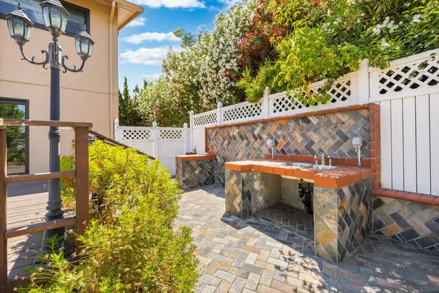 a view of a balcony with chairs