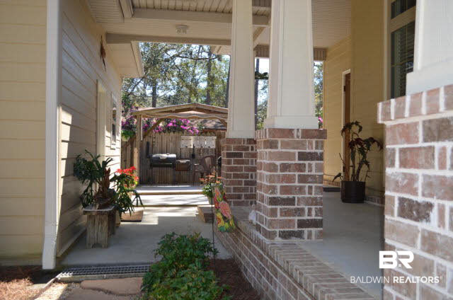 8919 Red Fish Pt Road Lillian, AL 36549 - Photo 7 of 46 Covered walkway from 2 car garage.