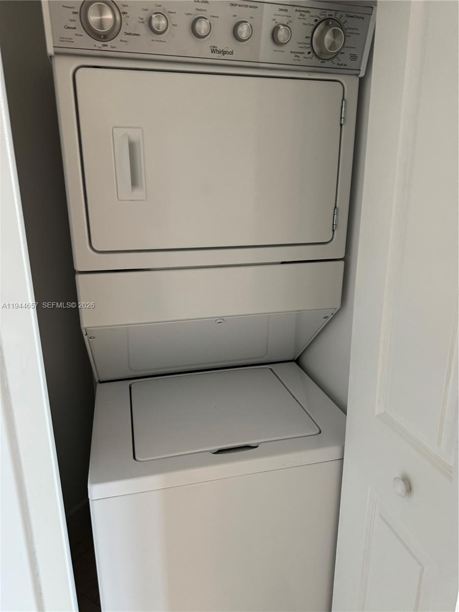 170 Southeast 14th Street, Unit 2405 Miami, FL 33131 - Photo 23 of 25 a close up view of washer and dryer