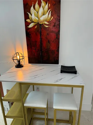 a vase of flowers sitting on a table