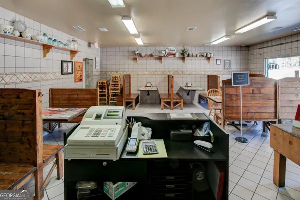 a view of a dining room with furniture