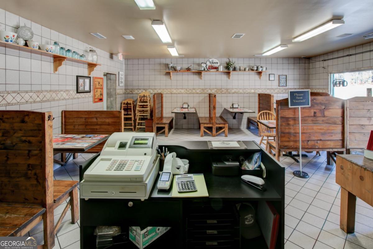 868 County Line Road Resaca, GA 30735 - Photo 12 of 44 a view of a dining room with furniture