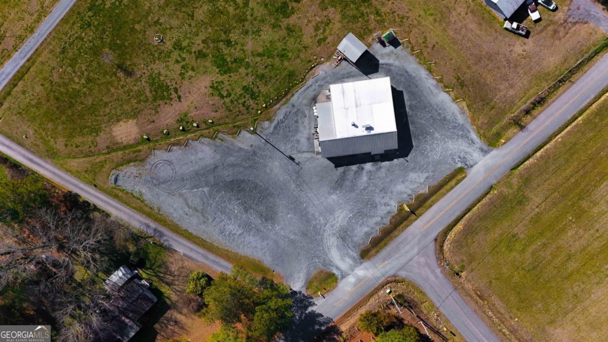 868 County Line Road Resaca, GA 30735 - Photo 3 of 44 a view of a balcony with a floor to ceiling window
