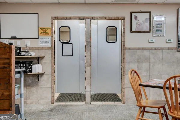 a view of storage and utility room with washer and dryer