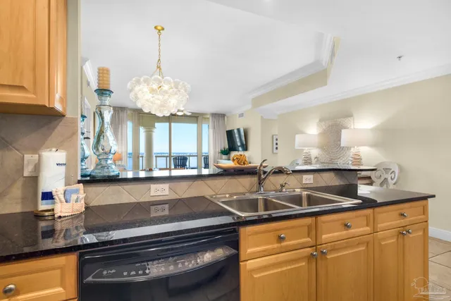 a kitchen with sink and window