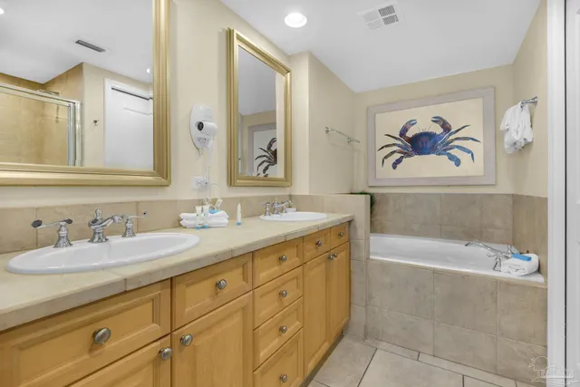 a bath room with a sink and a mirror