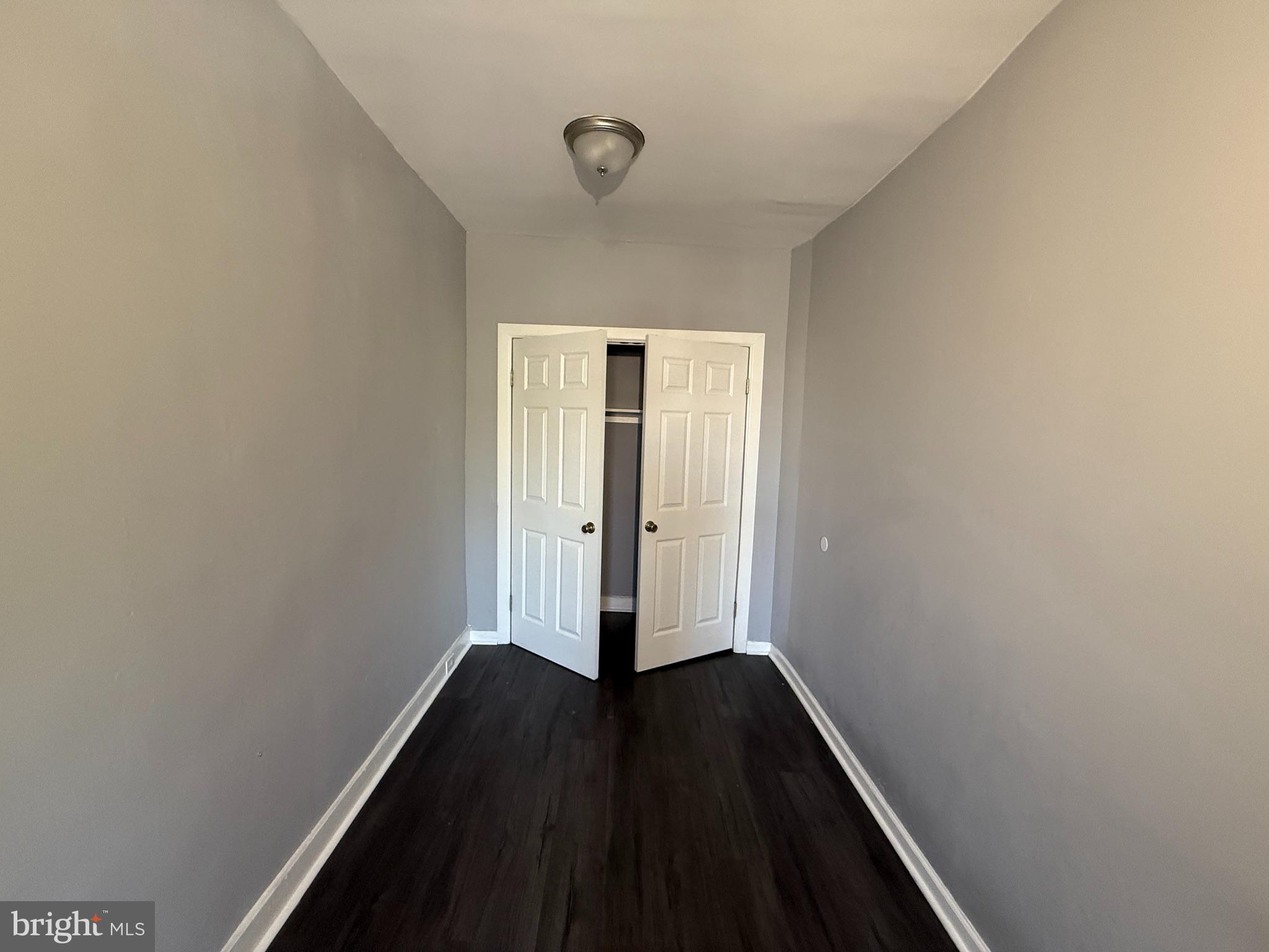 1635 Normal Avenue Baltimore, MD 21213 - Photo 12 of 18 a view of small space with wooden floor and a window