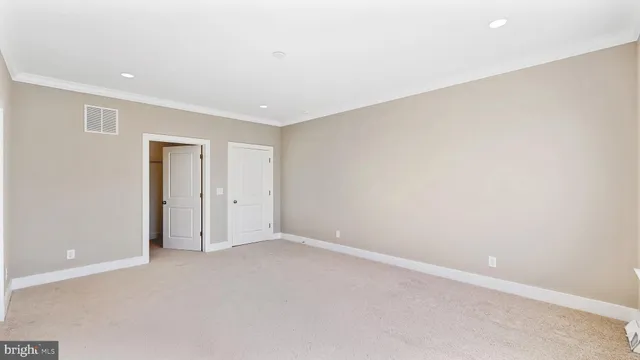 a bathroom with a granite countertop sink a shower and a mirror