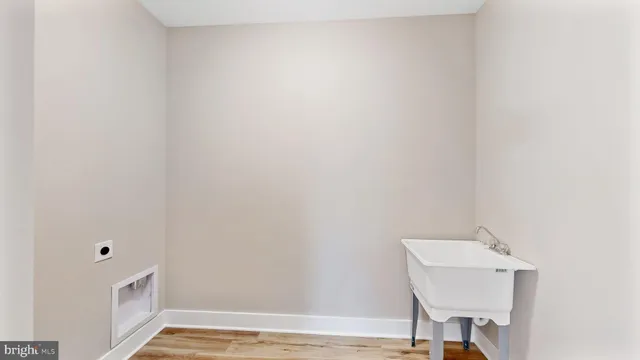 a bathroom with a double vanity sink mirror and