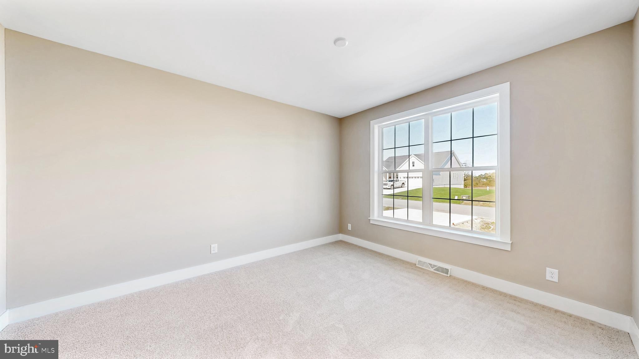 22012 Antlered Way Georgetown, DE 19947 - Photo 29 of 58 an empty room with a window
