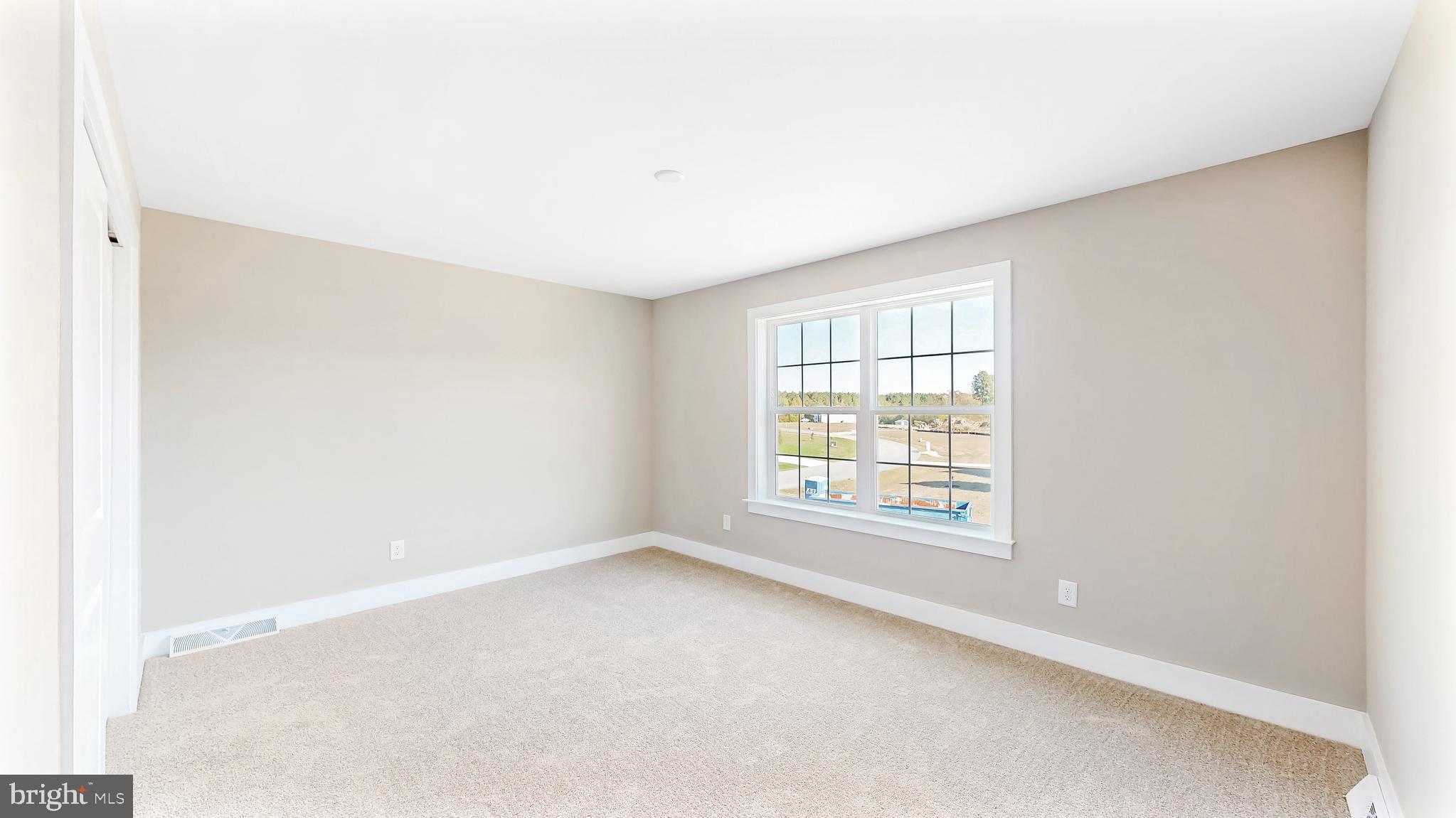 22012 Antlered Way Georgetown, DE 19947 - Photo 33 of 58 an empty room with a window