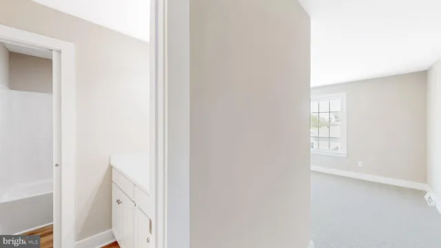 an empty room with a natural light