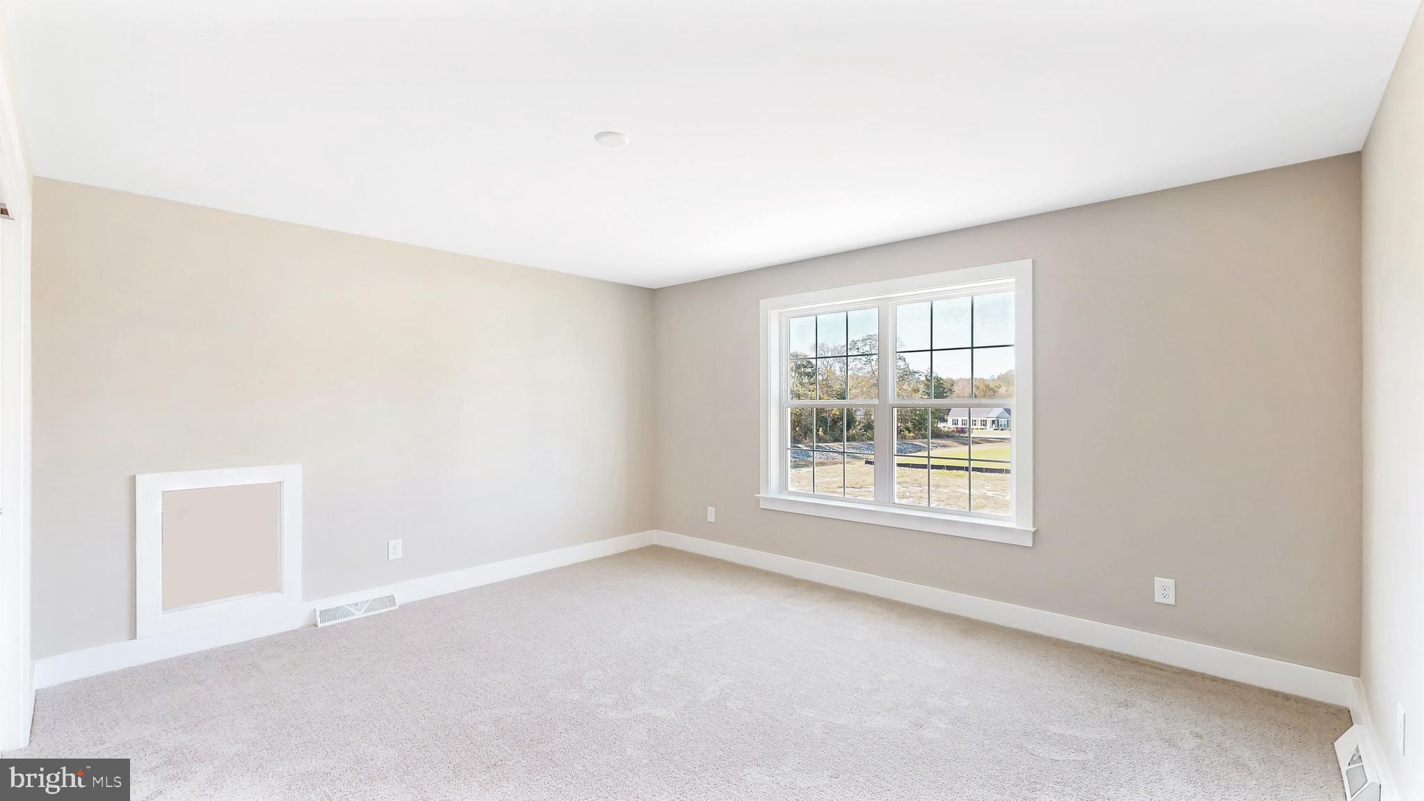 22012 Antlered Way Georgetown, DE 19947 - Photo 36 of 58 an empty room with a window