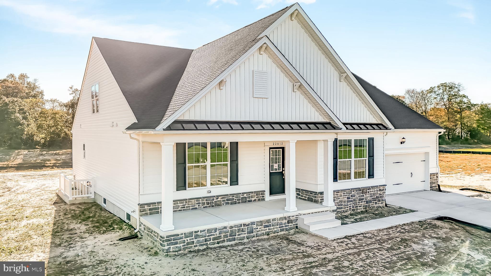 22012 Antlered Way Georgetown, DE 19947 - Photo 38 of 58 a view of a house with a yard