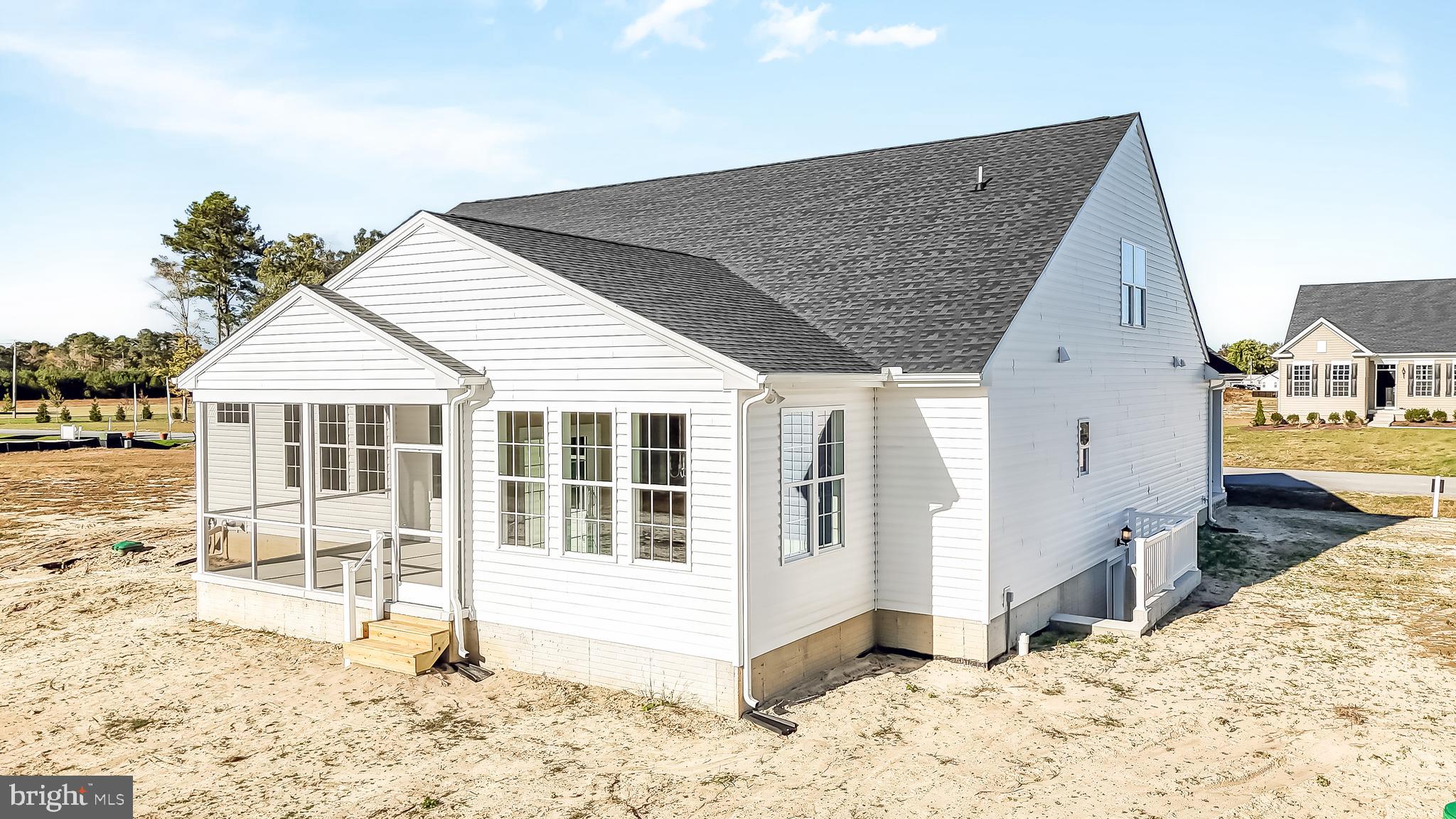 22012 Antlered Way Georgetown, DE 19947 - Photo 42 of 58 a view of a house with wooden floor and a snow on the wall