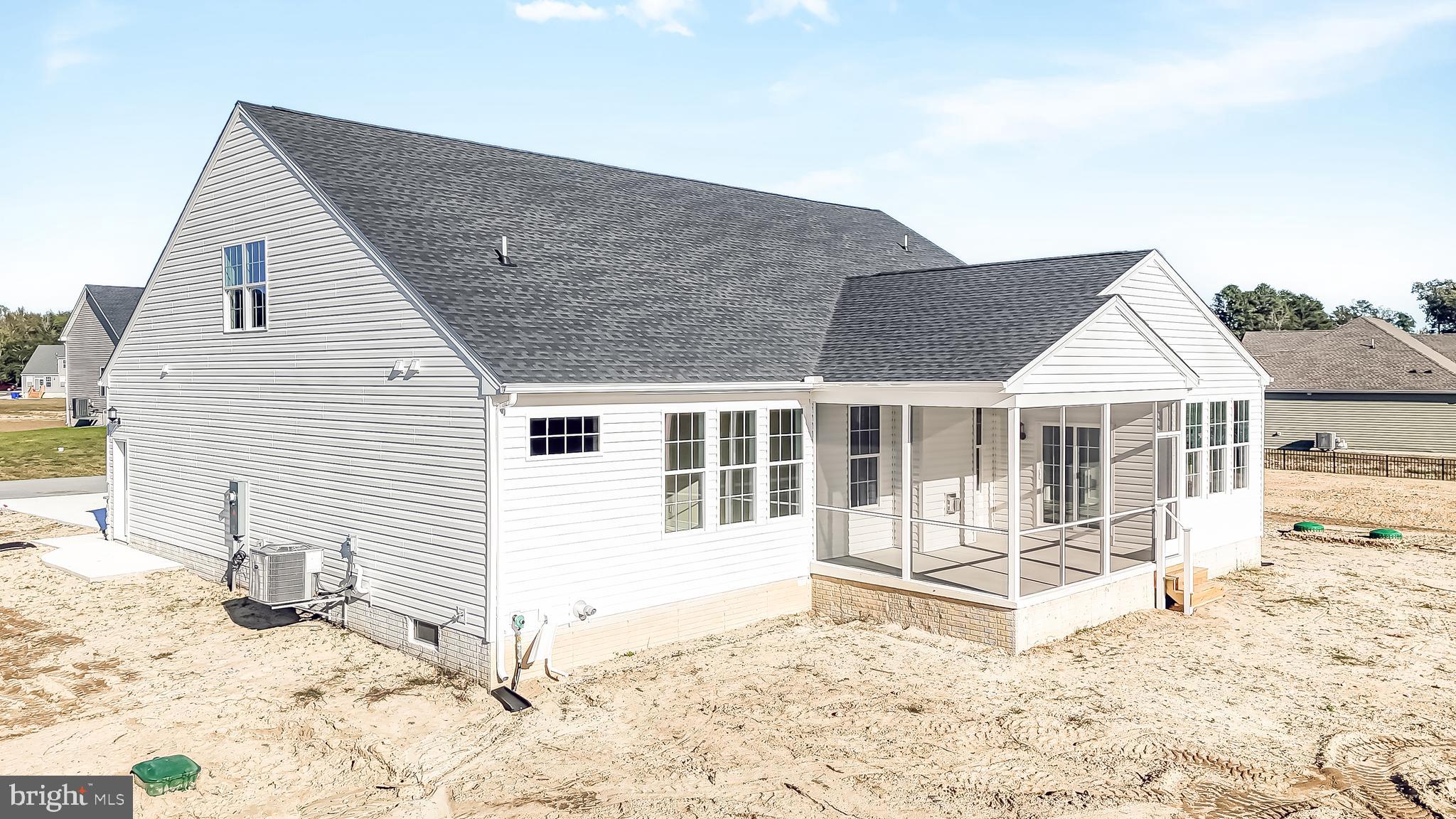 22012 Antlered Way Georgetown, DE 19947 - Photo 43 of 58 a view of a house with snow on the road